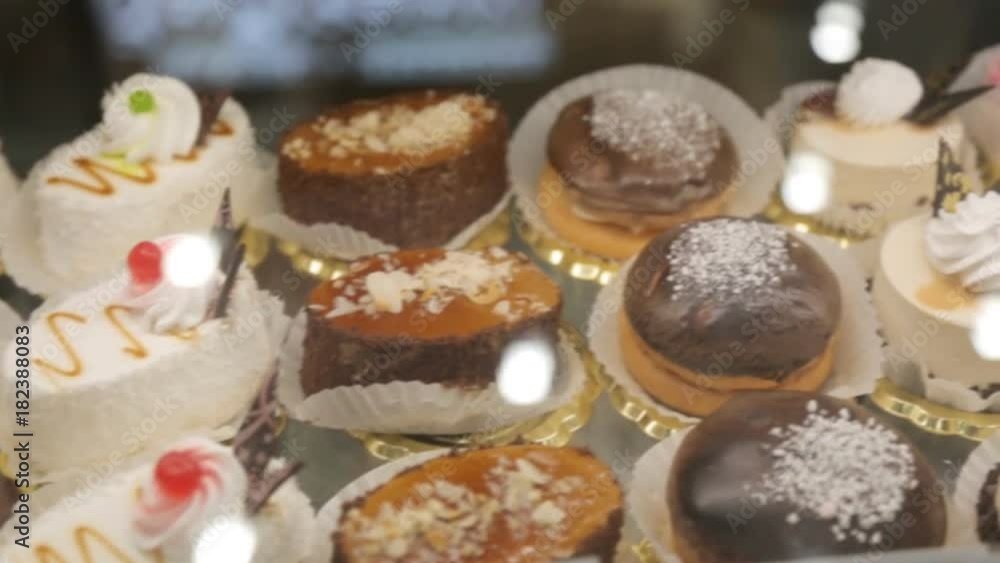 Storefront with tasty cakes closeup Storefront with tasty cakes closeup