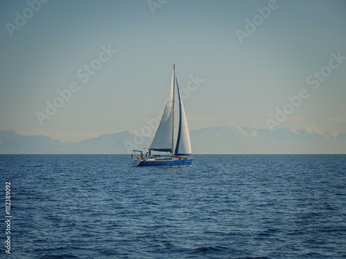 CROATIA, ADRIATIC SEA, 2017.11.07: Sailing boat in front of islands. © 2STOCKista