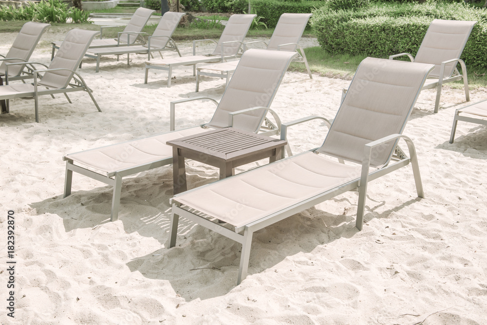 Beach chairs on the white sand beach