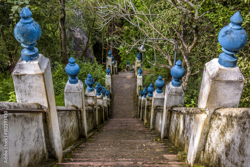 Long stone stairs to old Buddhist rock temple, Mulkirigala, Sri Lanka photo