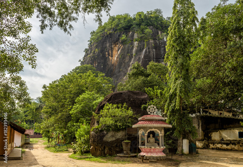 Mount with ancient Buddhist temple in Mulkirigala, Sri Lanka photo