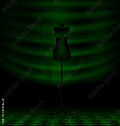 black craft dummy in the dark green room