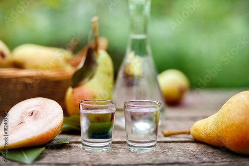 Pear brandy in two shot glass