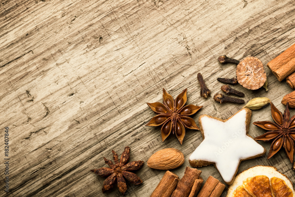 Christmas spices - Flat lay, background with cinnamon, anise, cookie and other Christmas spices - Flat lay, background with cinnamon, anise, cookie and other