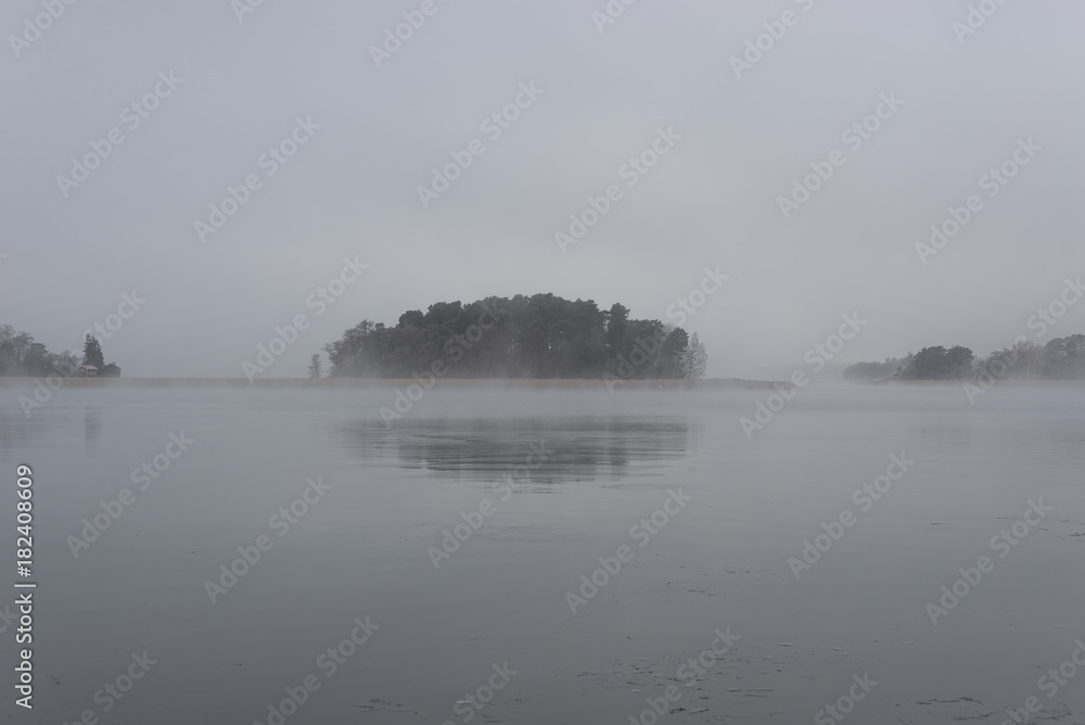 Island in morning mist