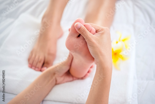 Foot massage in spa salon