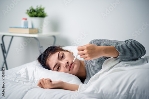 Sick Woman On Bed Concept