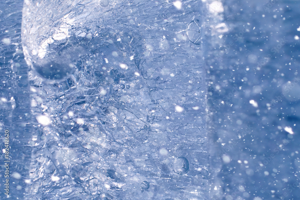 Texture of ice in winter. Pieces of frozen water on a street in Texture of ice in winter. Pieces of frozen water on a street in