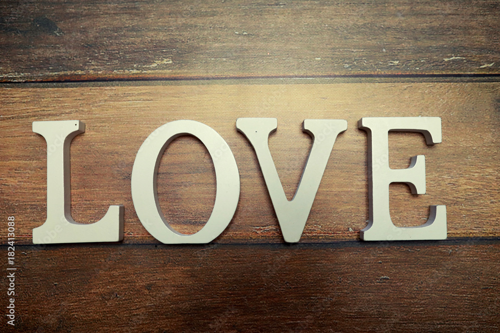 word Love from wooden letters on background word Love from wooden letters on background