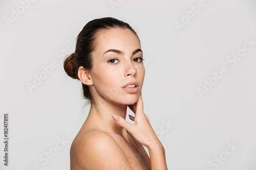 Beauty portrait of a young pretty half naked woman