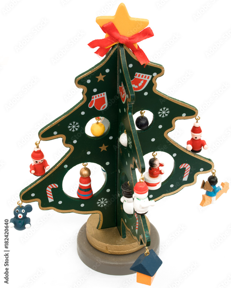 Painted wooden christmas tree isolated on white background