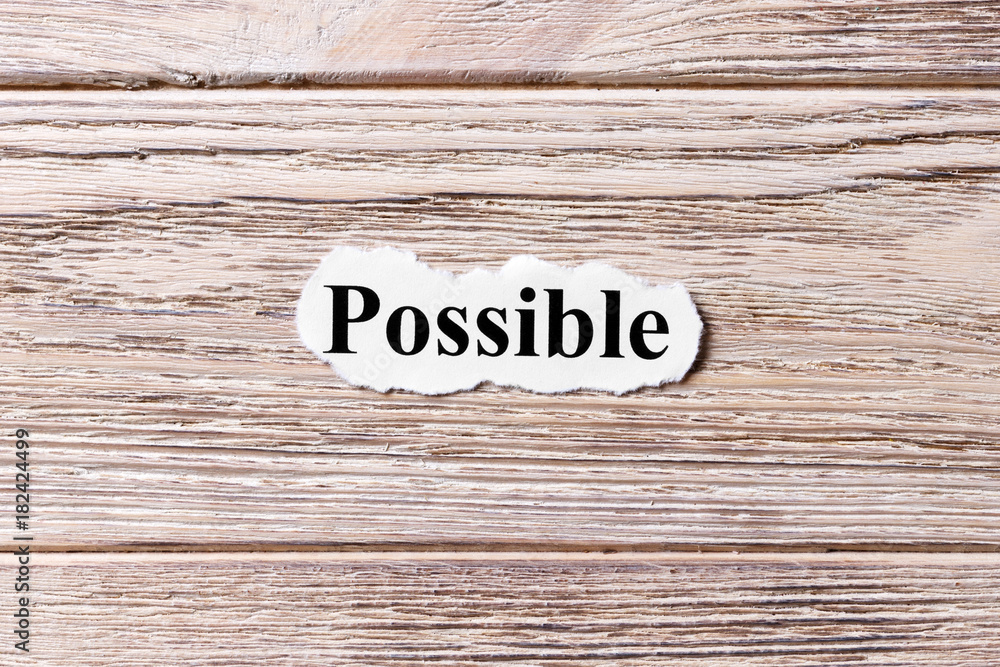 possible of the word on paper. concept. Words of possible on a wooden background possible of the word on paper. concept. Words of possible on a wooden background