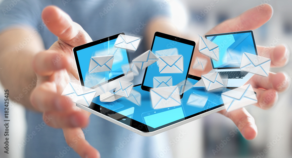 Businessman receiving e-mails on his digital devices 3D rendering Businessman receiving e-mails on his digital devices 3D rendering