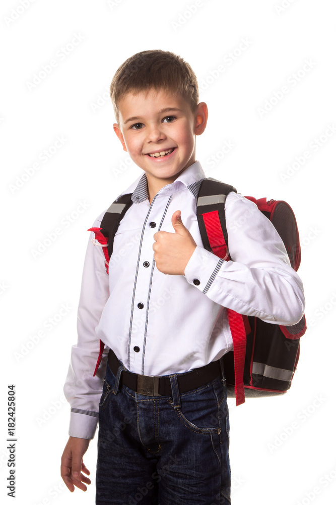 Cheerful school boy with backpack, with thumb up, love going to school on white background Cheerful school boy with backpack, with thumb up, love going to school on white background