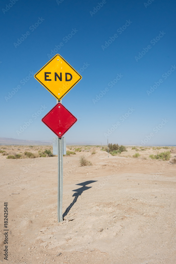 End road sign on a dirt road in the middle of the Mojave desert in Bombay Beach California, near the Salton sea