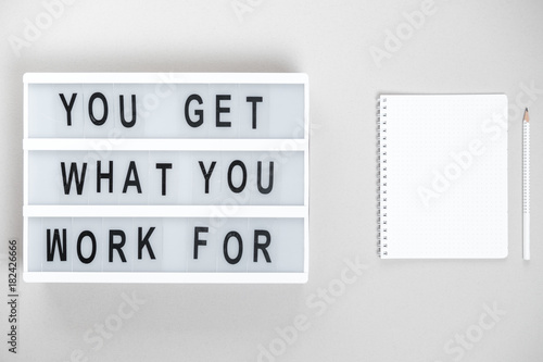 Motivational board and stationery. Business concept. Top view, flat lay