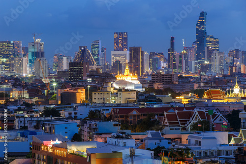 Bangkok city skyline with Wat Saket at night.