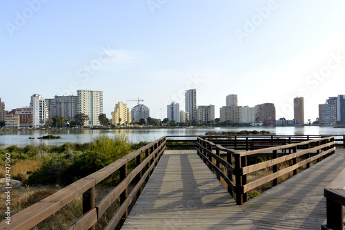 A view on Calpe city and salt lake with flamingos from view point las salinas