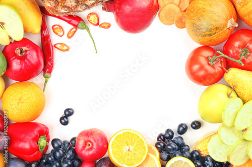 Various fruits and vegetables on white background