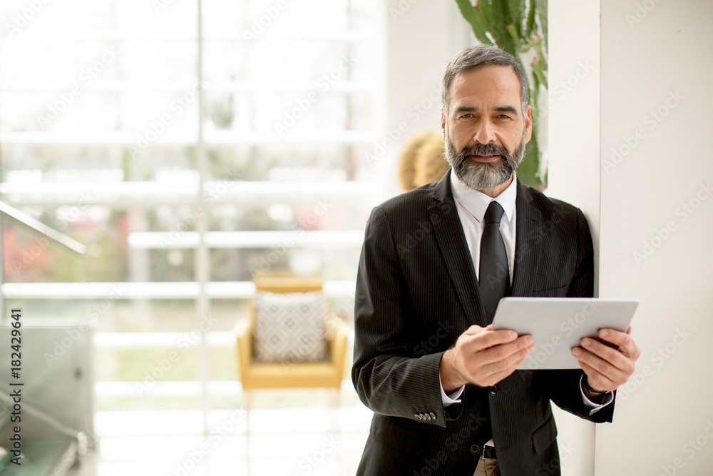 Businessman with tablet in the office
