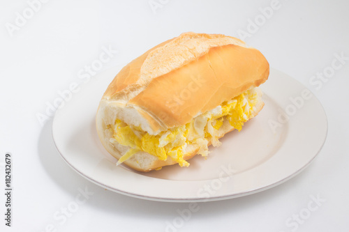 Bread with scrambled egg. Brazilian Pao com ovo
