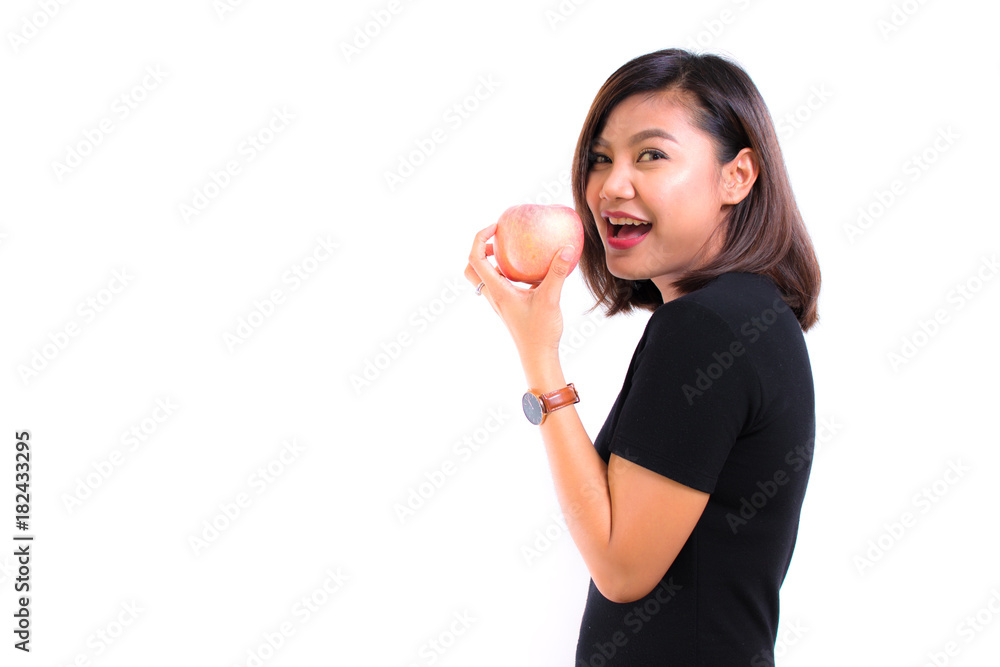 Young Asian woman holding light red apple on white background. Portrait of beautiful Asian woman holding light red apple for healthy eating diet concepts. healthy food concept. life style concept. Young Asian woman holding light red apple on white background. Portrait of beautiful Asian woman holding light red apple for healthy eating diet concepts. healthy food concept. life style concept.