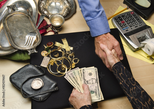 woman selling gold and silver