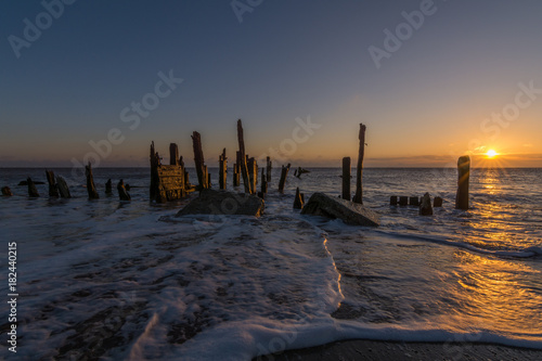 Spurn Point old wooden groynes and beach sea defences photo