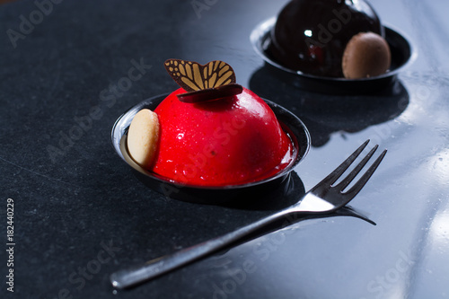Canvastavla French pastry small ball cakes made with fresh strauberry and truffel creme