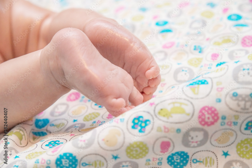 The legs of the baby. The legs of the baby.