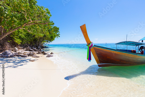 Longtail Boat Moored At Aonang Beach Against Sky © kjekol