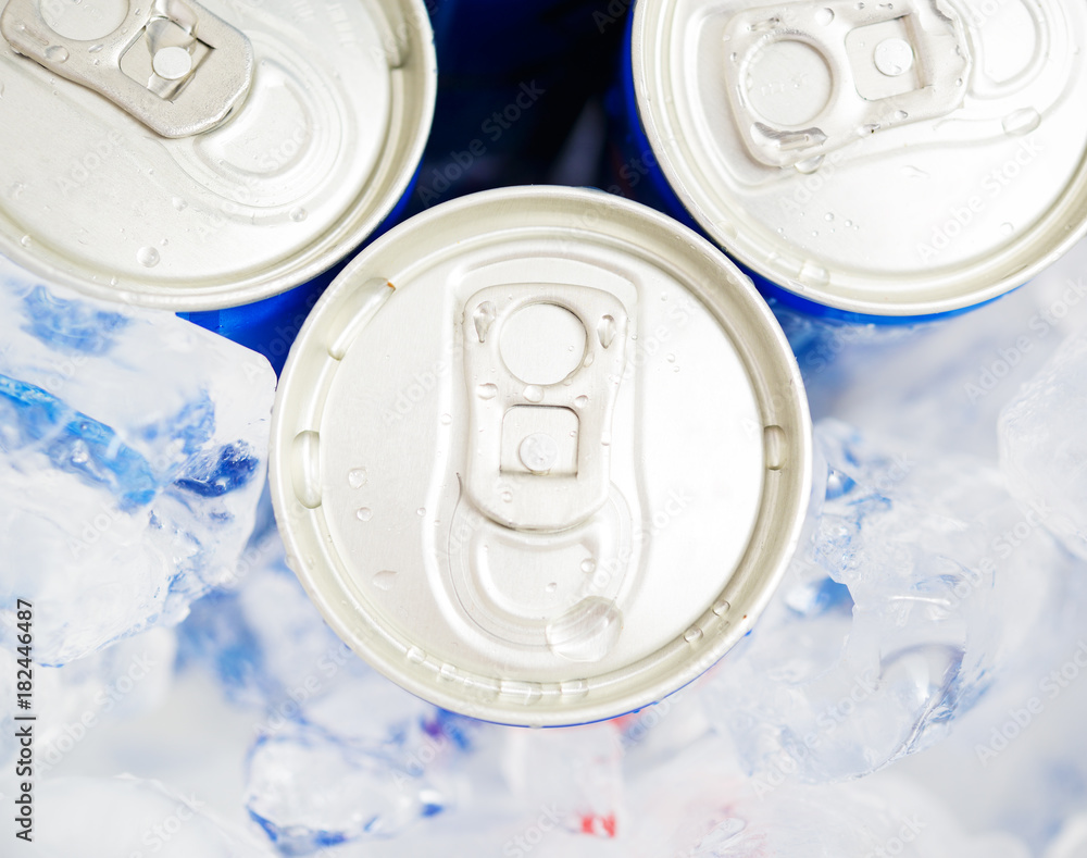 Soda cans in ice with condensation - drink can Stock Photo | Adobe Stock