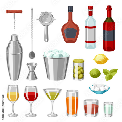 Cocktail bar set. Essential tools, glassware, mixers and garnishes.