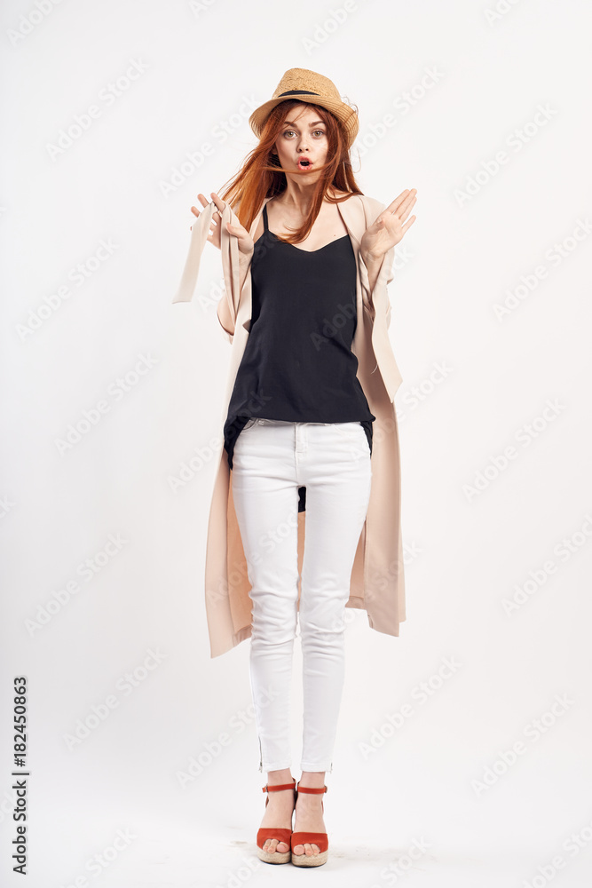 Young beautiful woman in full growth on white isolated background, emotions, fashion, style, beauty Young beautiful woman in full growth on white isolated background, emotions, fashion, style, beauty