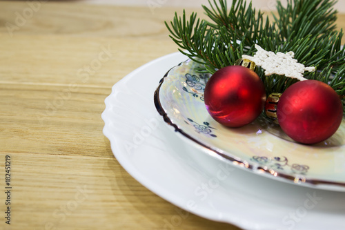 Festive table with Christmas decorations. Close-up.