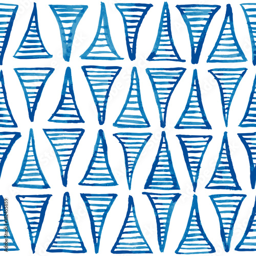 Hand painted blue ink striped triangles. Christmas tree shaped ornament. Seamless vector pattern