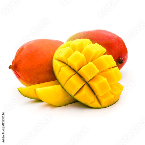 Mango whole and slice cut to cubes isolated on a white background. product or package design element