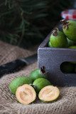 Winter Christmas Feijoa cutted sliced on the rustic background