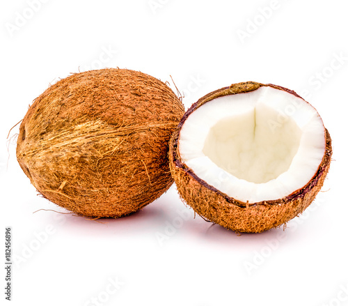 close up of whole and broken coconut fruit isolated on white background. product or package design element