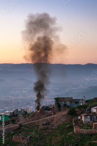 Garbage Burning on a Hillside