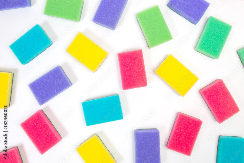 colored sponges on white background