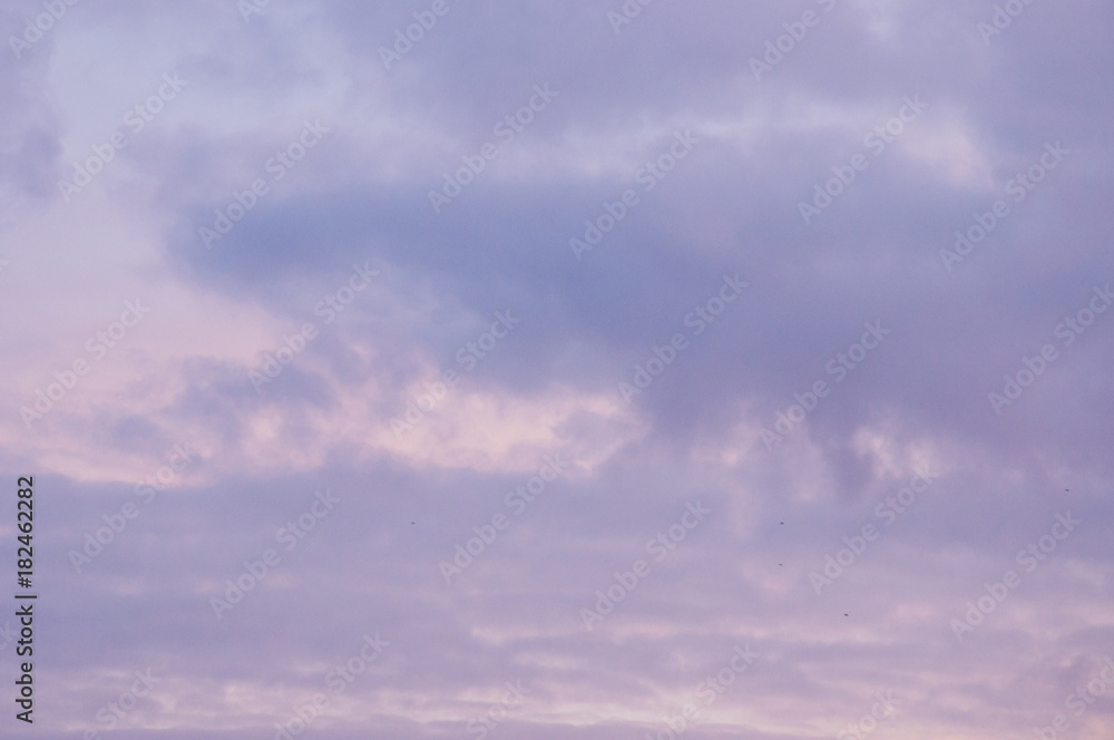Background from the clouds at sunset or dawn with space for text