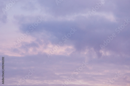 Background from the clouds at sunset or dawn with space for text