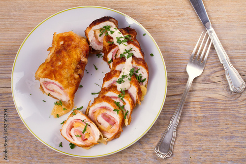 Chicken breast wraps with bacon and cheese, overhead, top view