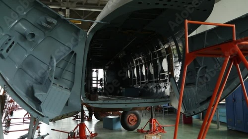 Disassembled cabin of the aircraft from the inside in the workshop.