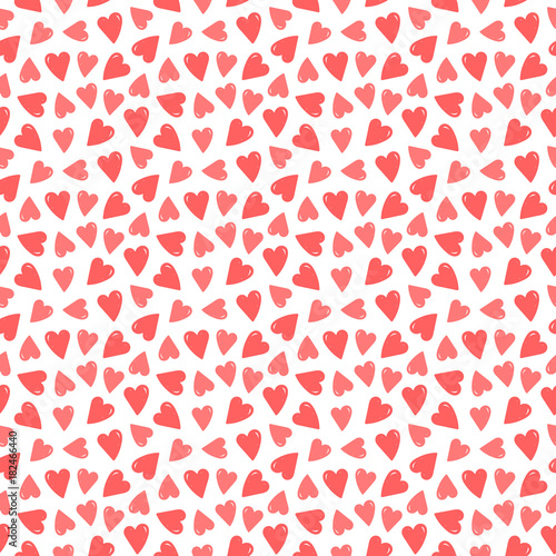 Cute seamless pattern background with hand drawn, doodle red and pink hearts.