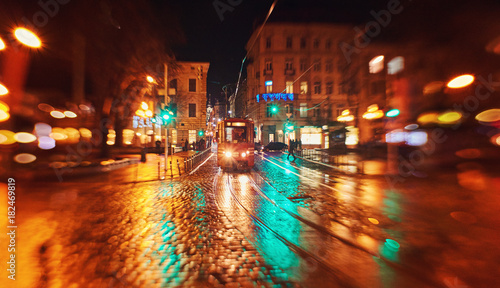 city night street paving stone bench