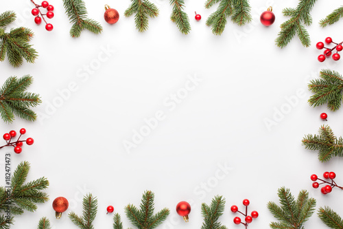 Christmas composition. Frame made of christmas decoration on white background. Flat lay, top view.