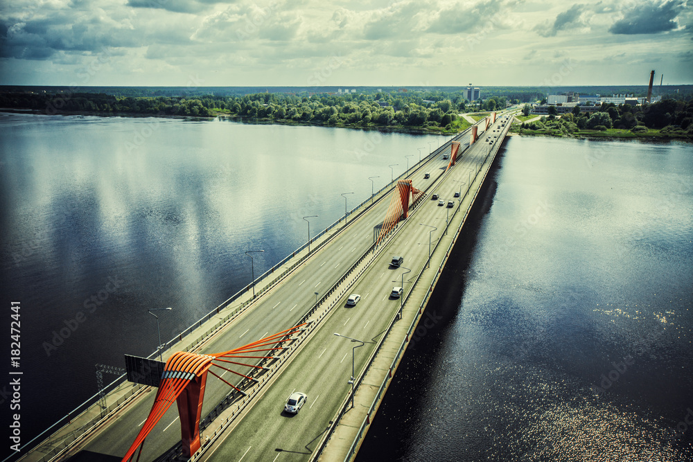 Naklejka premium Riga city bridge drone shooting above daugava river