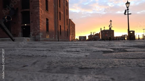 4k Albert docks in Liverpool, sun set, cobblestones and victorian buildings